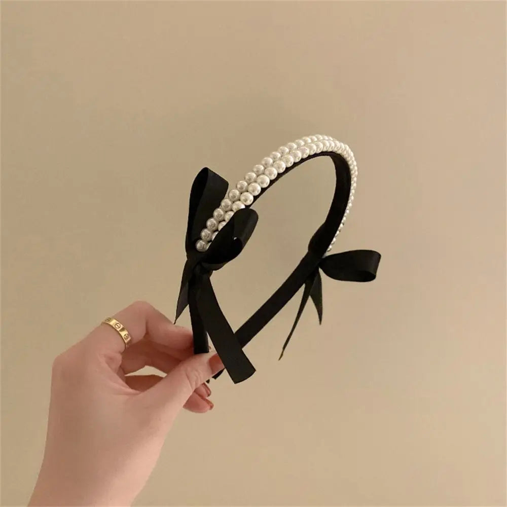 Diadema con nudo de perla: un accesorio para el cabello elegante y moderno