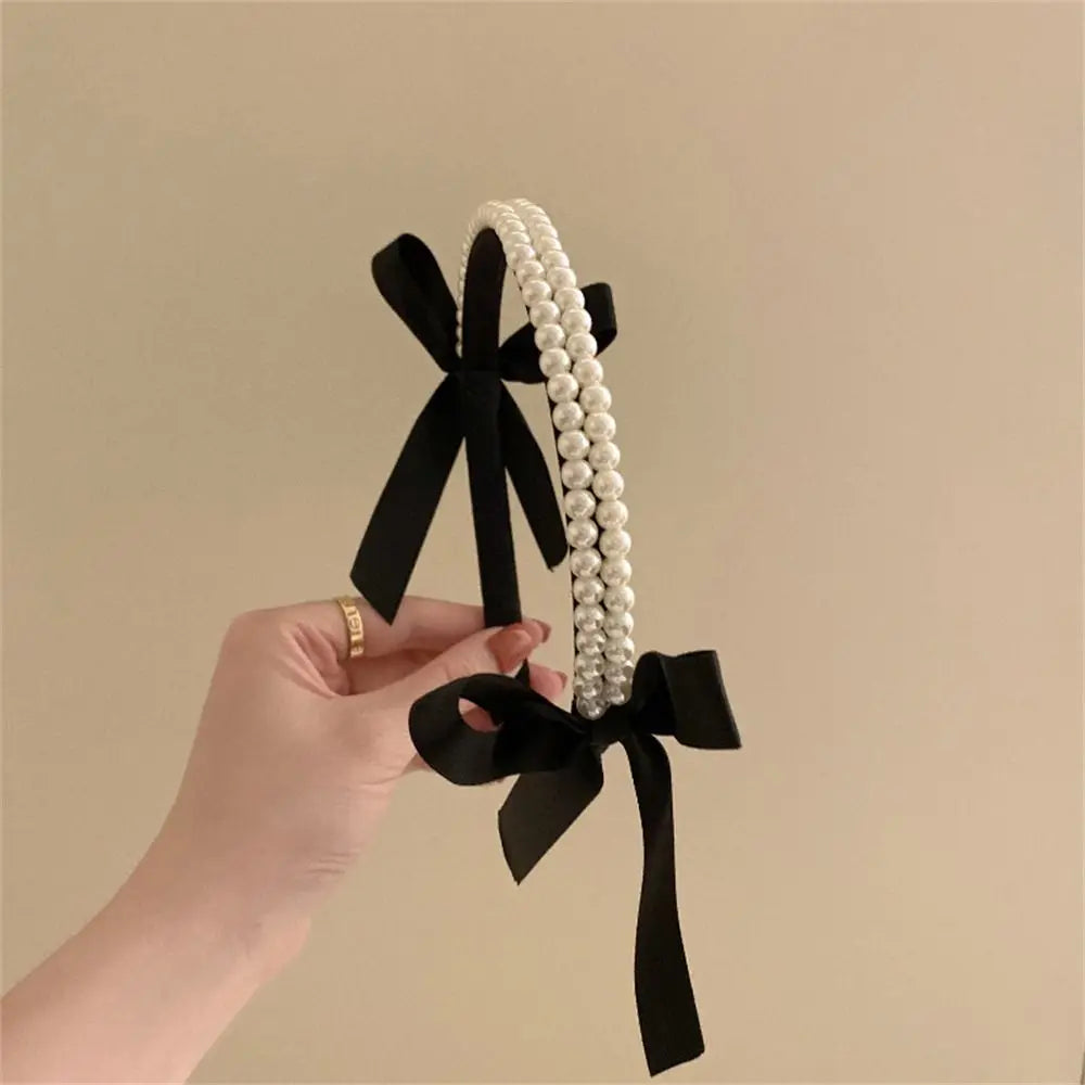 Diadema con nudo de perla: un accesorio para el cabello elegante y moderno