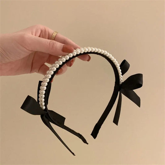 Diadema con nudo de perla: un accesorio para el cabello elegante y moderno