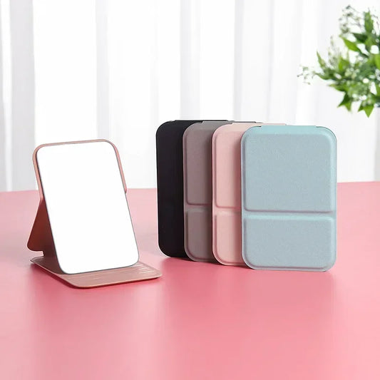 Espejo de maquillaje plegable de piel sintética: compacto y elegante