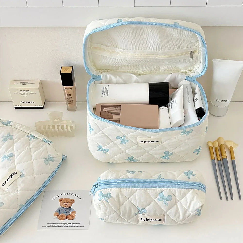 Bolsa de maquillaje de algodón acolchado, con diseño floral y portátil 