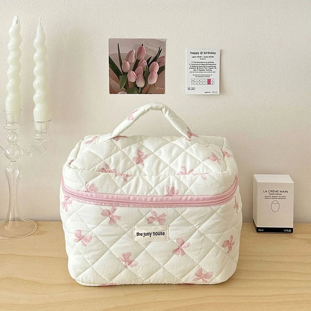 Bolsa de maquillaje de algodón acolchado, con diseño floral y portátil 