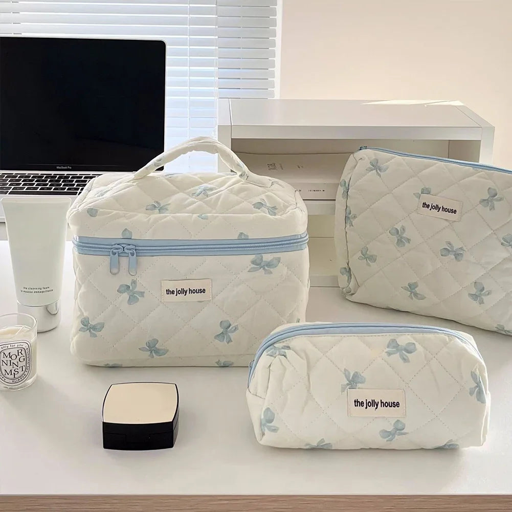 Bolsa de maquillaje de algodón acolchado, con diseño floral y portátil 