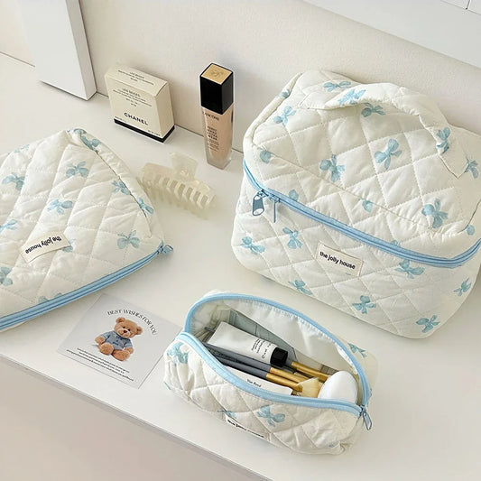 Bolsa de maquillaje de algodón acolchado, con diseño floral y portátil 