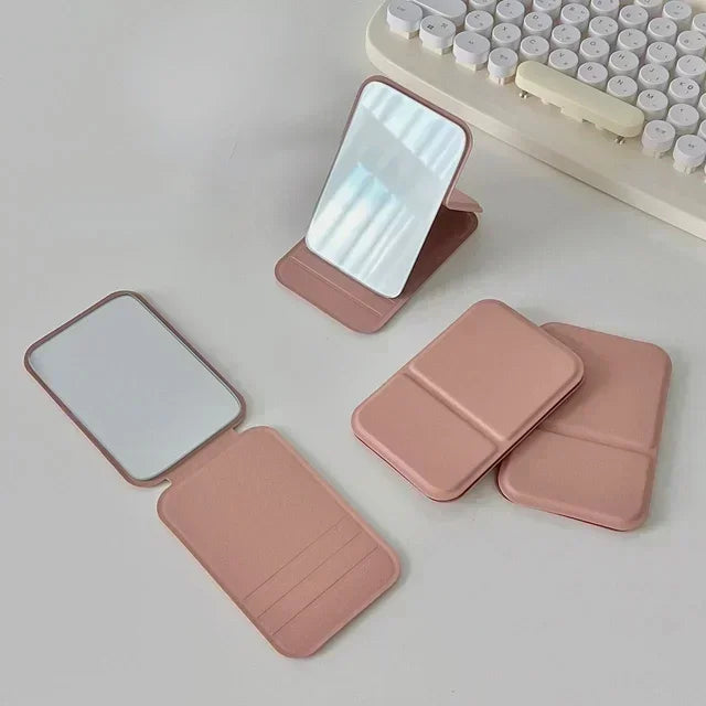 Espejo de maquillaje plegable de piel sintética: compacto y elegante