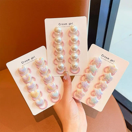 Paquete de 10 gomas para el pelo para niña: diseños de corazón, estrella y bonitos