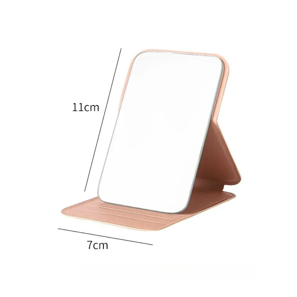 Espejo de maquillaje plegable de piel sintética: compacto y elegante