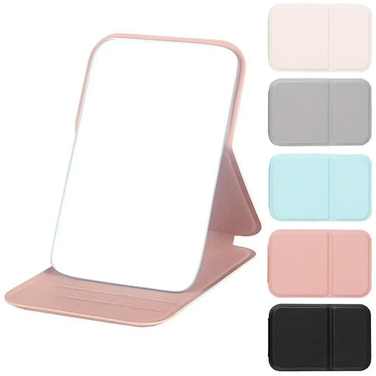 Espejo de maquillaje plegable de piel sintética: compacto y elegante