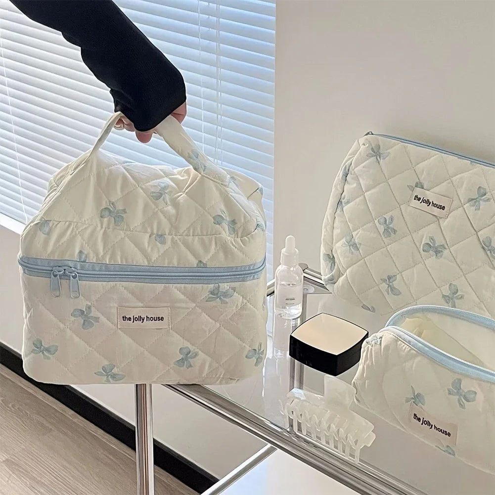 Bolsa de maquillaje de algodón acolchado, con diseño floral y portátil 