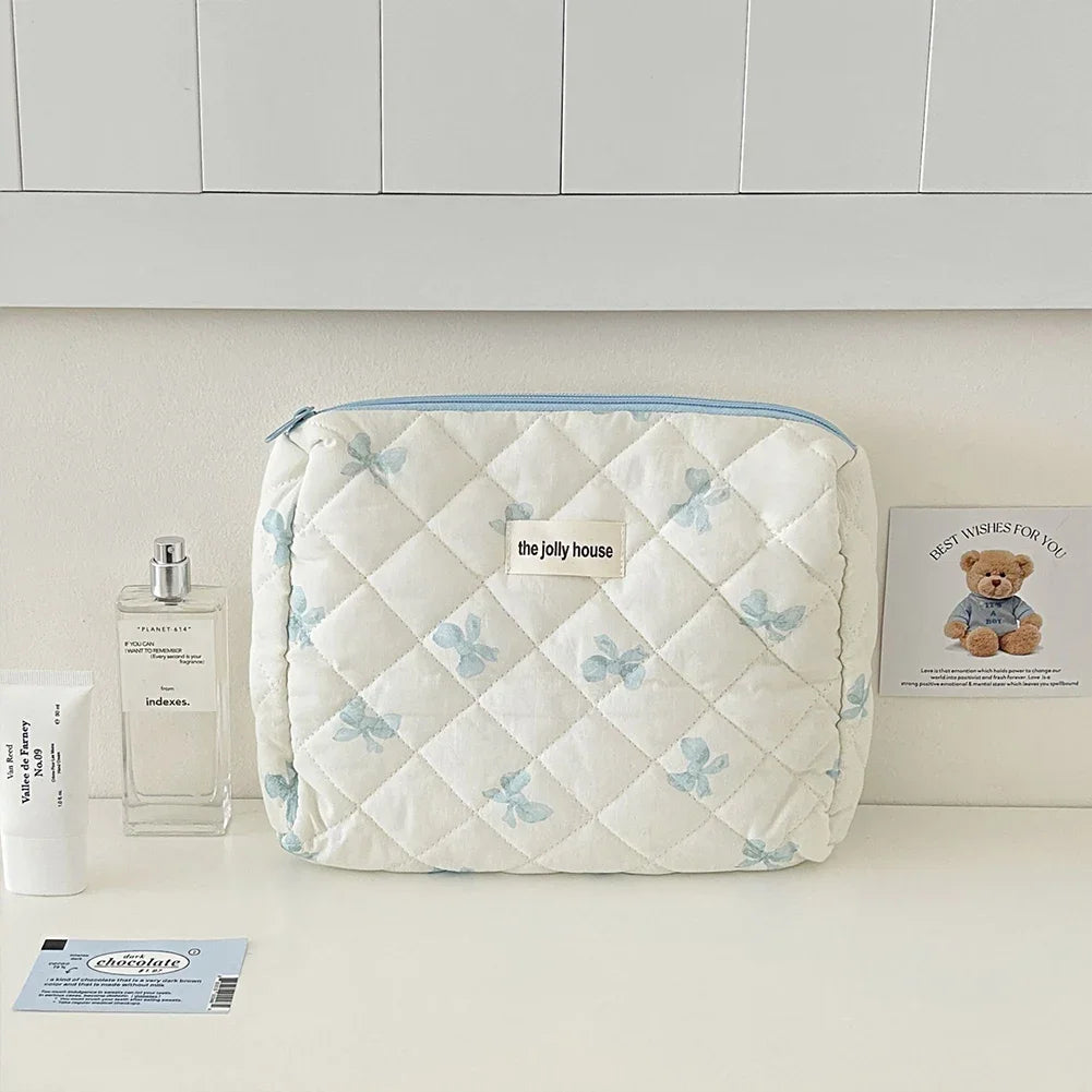 Bolsa de maquillaje de algodón acolchado, con diseño floral y portátil 