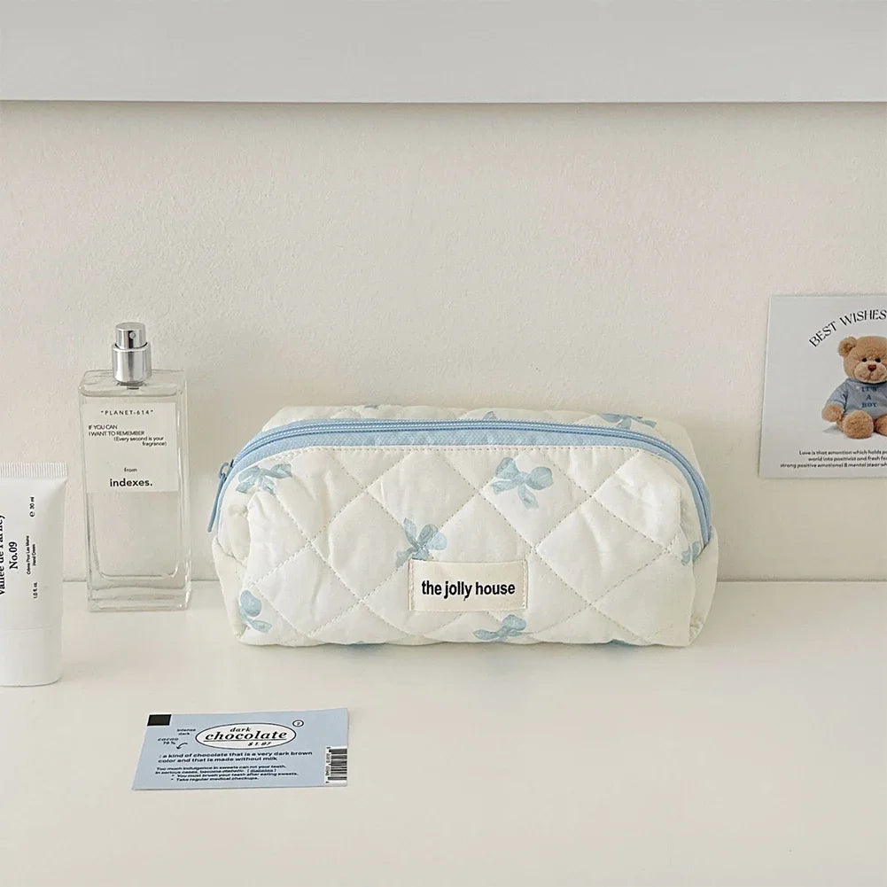 Bolsa de maquillaje de algodón acolchado, con diseño floral y portátil 