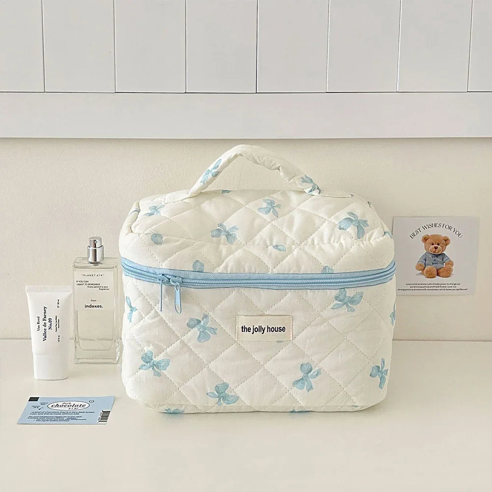 Bolsa de maquillaje de algodón acolchado, con diseño floral y portátil 