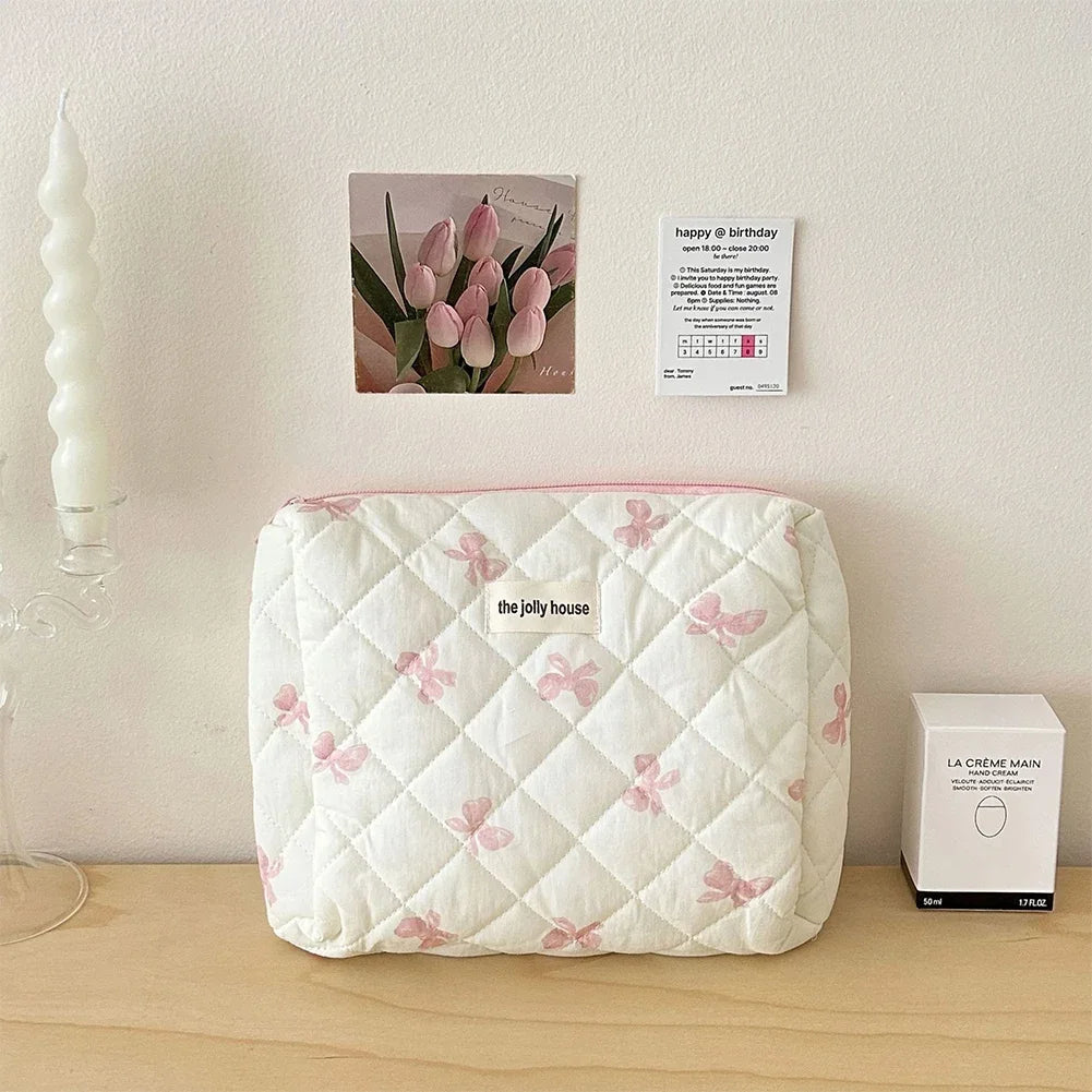 Bolsa de maquillaje de algodón acolchado, con diseño floral y portátil 